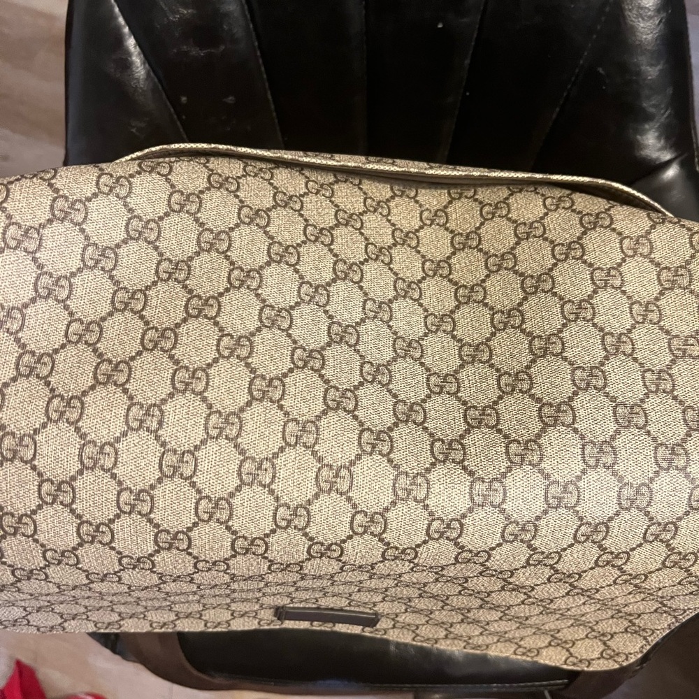 Gucci supreme diaper bag